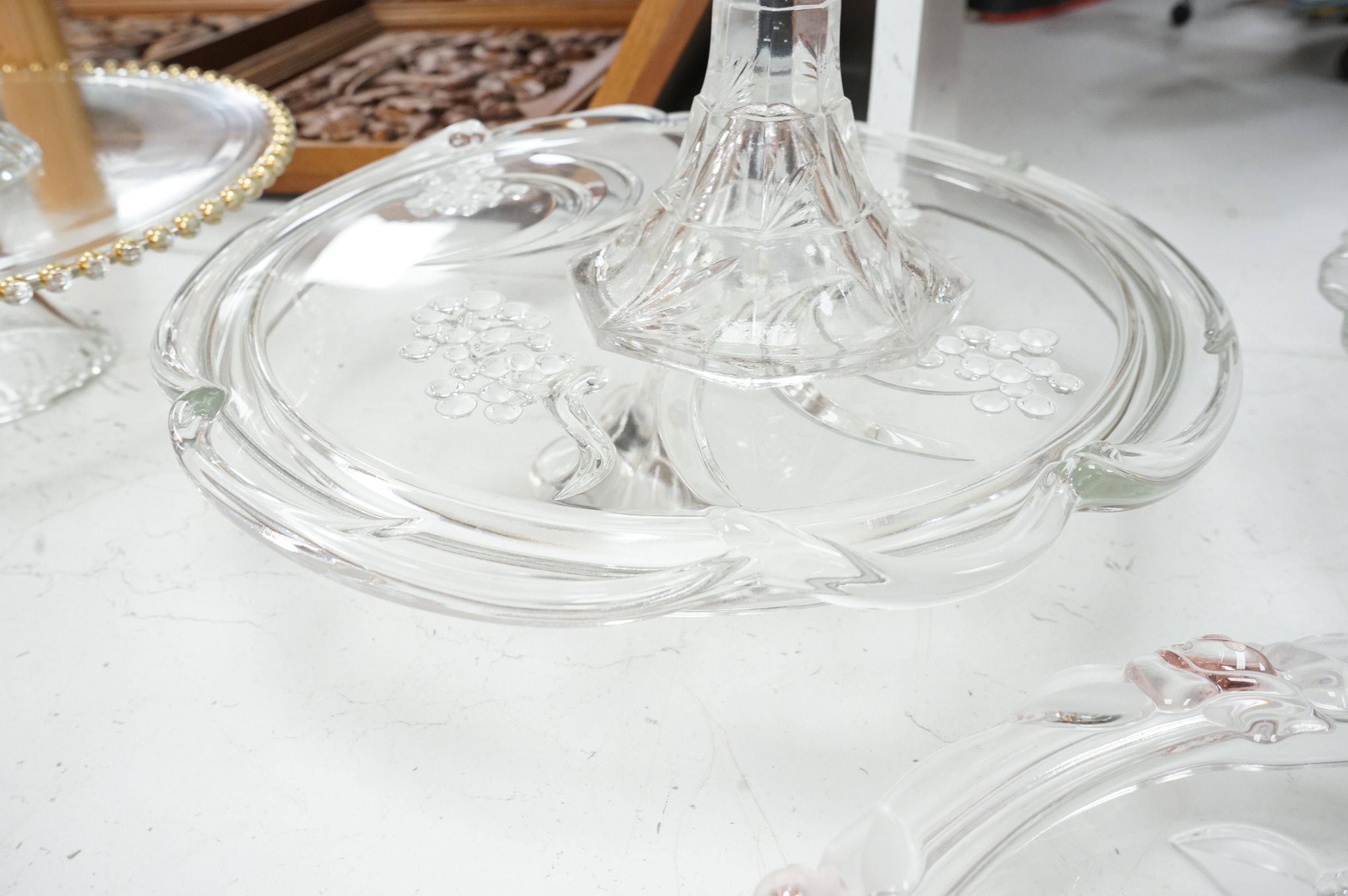 Seven decorative 20th century glass cake tazza, largest 36cm diameter